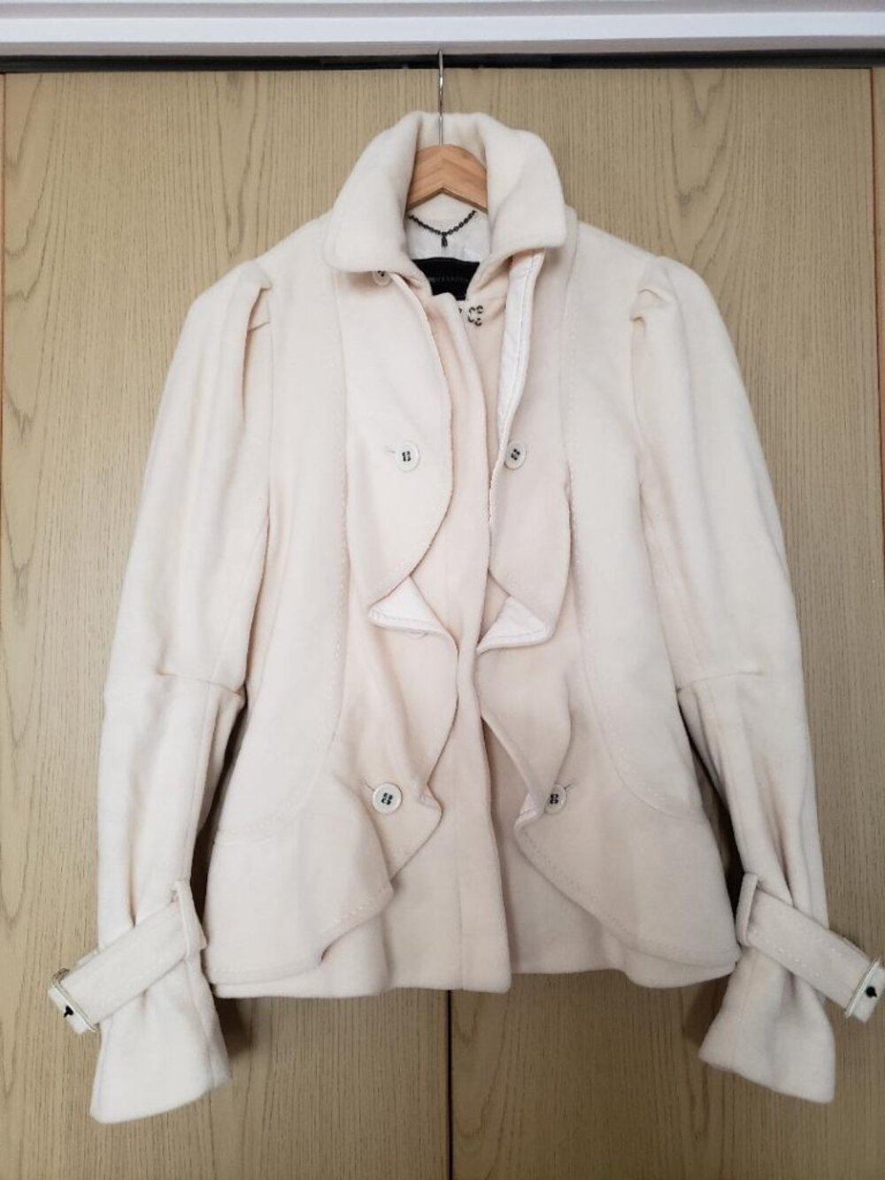 BCBGMAXAZRIA cream colored coat Small 75% Wool; 25% Nylon